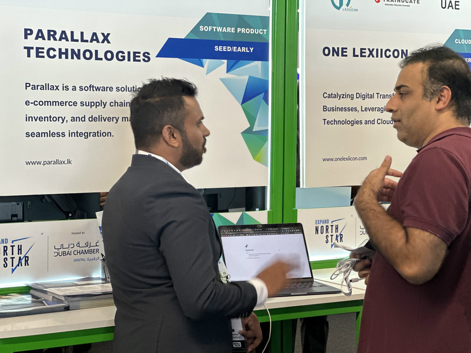 Namal Attanayake demonstrating Parallax software to a visitor at Expand North Star in Dubai